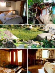 Banheira e cama do chal&eacute; da Pousada Jardim das &Aacute;guas em Visconde de Mau&aacute;